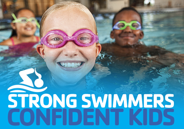 girl swimming smiling in pool