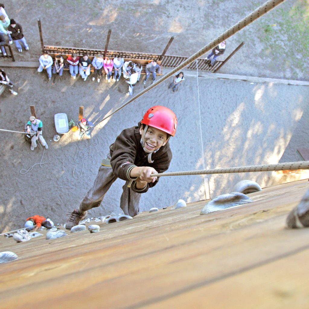 boy wall climbing