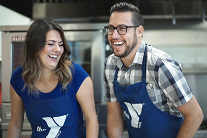 Two YMCA staff members smiling