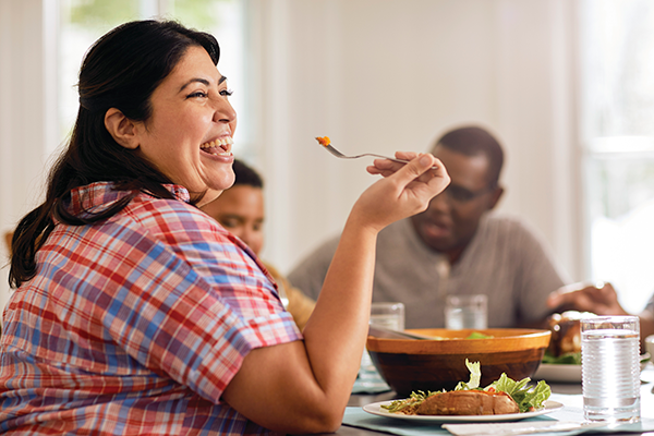 Photo of people eating at a table