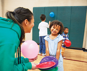 Happy girl celebrating her birthday at the YMCA