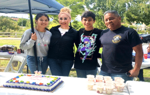 Mario and family from Jackie Robinson Family YMCA