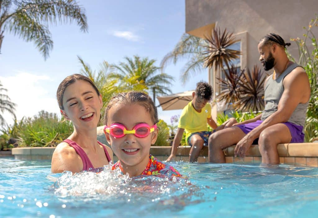 family at the pool